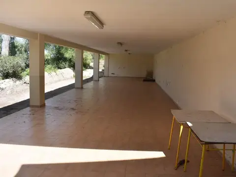 porche cubierto de la casa, usado como sala polivalente