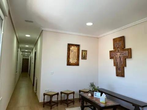 pasillo de las habitaciones de la casa de espiritualidad